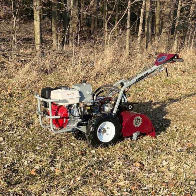 Brush Mower PD209HE Power Dog, red and gray, angled view with large wheels and engine.