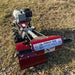 Brush Mower PD209HE Power Dog, red with large front handle and rugged wheels.