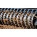 Firminator G3 cultipacker with serrated disks, featuring a black finish and soil contact.