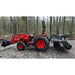 Firminator G3 - Disks and Cultipackers attached to a red tractor in a wooded setting.