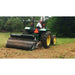 Firminator Rototiller RT with 16-inch cultipackers in action on grassy field.