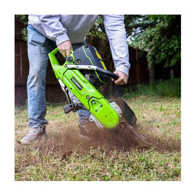 GeoRipper GR16 Trencher, green handheld tool with cutting blade in action on grass.