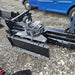 HD Soil Conditioner by Prime Attachments, angled view with black finish and hydraulic components.