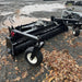 HD Soil Conditioner — Prime Attachments angled view, black with wheels and textured surface.