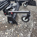 HD Soil Conditioner by Prime Attachments, black, angled view with hydraulic controls and wheels.