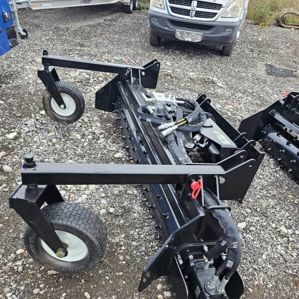 HD Soil Conditioner — Prime Attachments, black with wheels and hydraulic components, angled view.