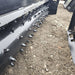 HD Soil Conditioner by Prime Attachments, angled view showcasing black body and rugged spikes.