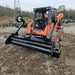 HD Soil Conditioner by Prime Attachments, black with a front view and functional wheels.