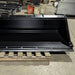 Heavy Duty Bucket for Skid Steer by Glacier Attachments, angled view, robust black design.