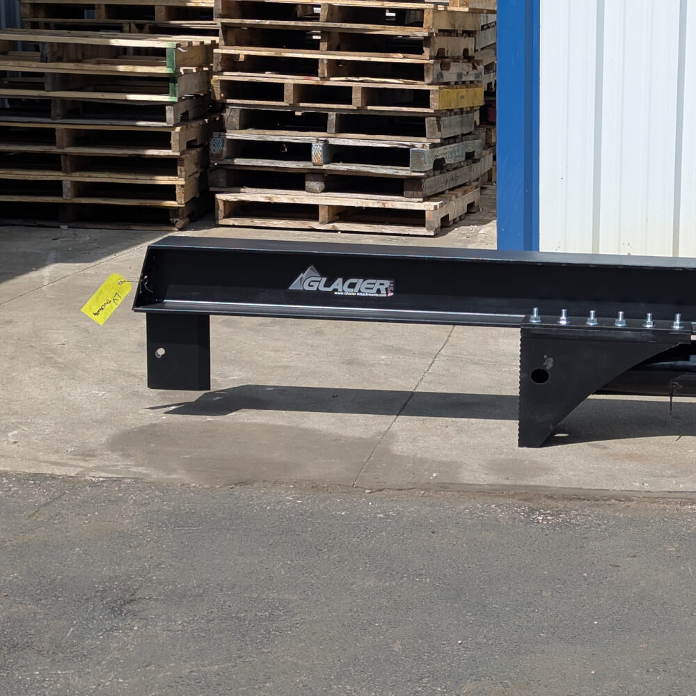 Inverted Log Splitter for Skid Steer by Glacier Attachments, black, angled view with grease rails.