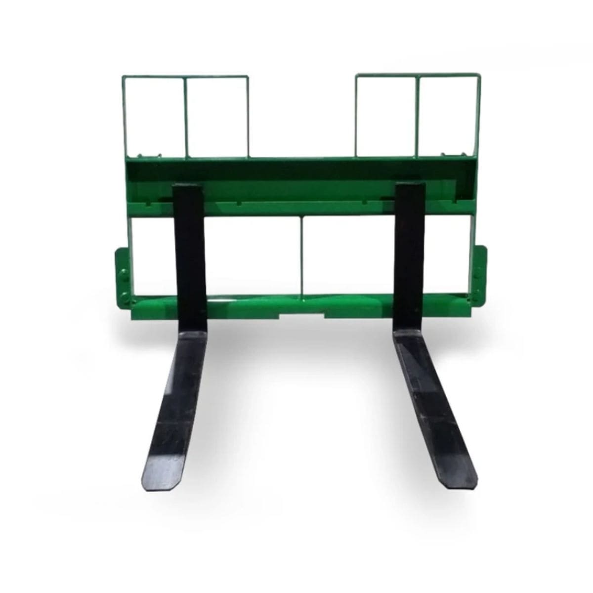 Quickly attachable pallet forks by Storm Attachments designed for John Deere tractors, ensuring efficient switching between implements.