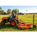 Lady riding on tractor using BEFCO Tornado BRC Rotary Cutter