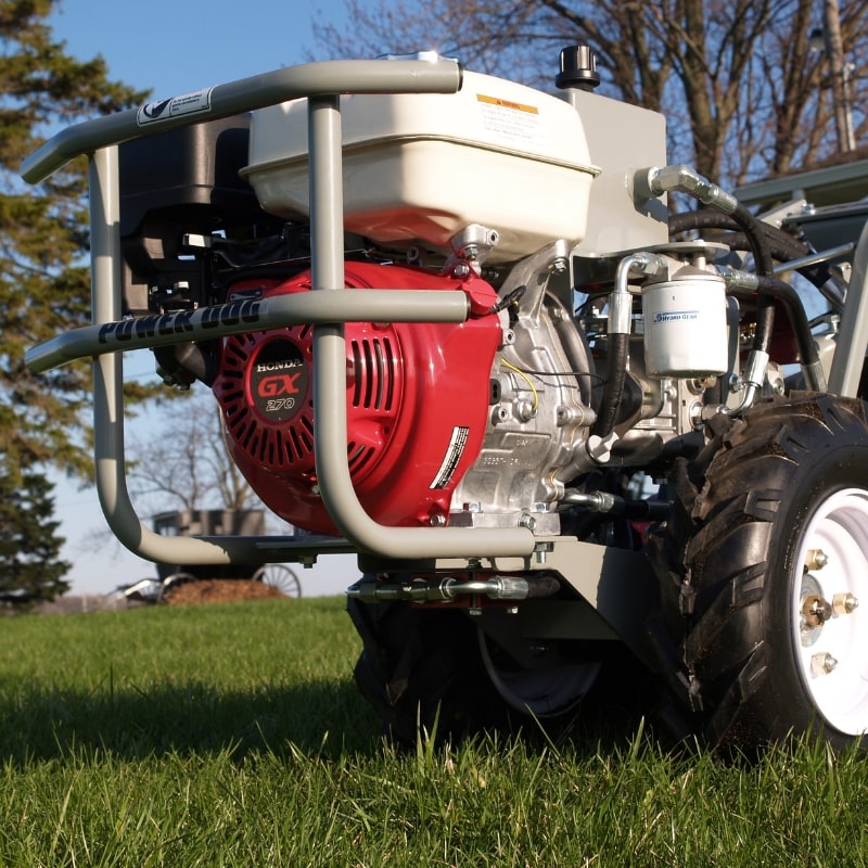 Engine and frame close-up of the Power Dog 209 Commercial Tiller showing Honda GX270 motor