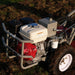 Power Dog 209 Commercial Tiller top view engine and hydro components in soil