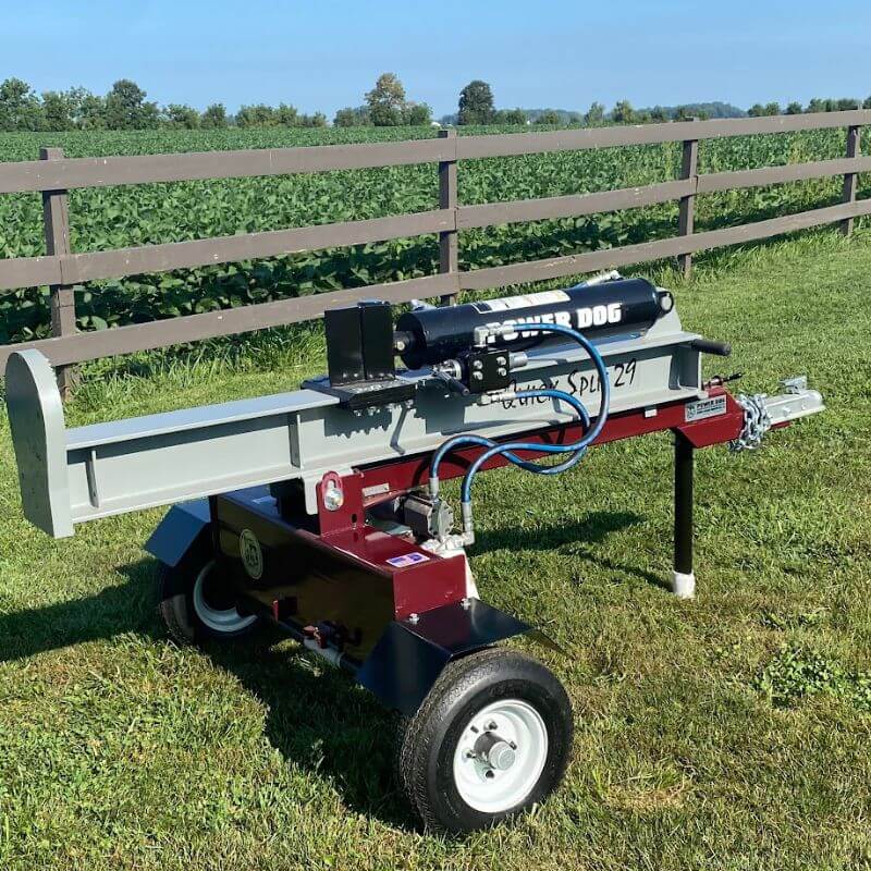 Power Dog Quick Split Log Splitter with 7HP Honda engine, gray and maroon, front view with wheels.