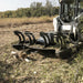 Prime Attachments Skid Steer Mower Attachment, black, angled view with curved cutting blades.