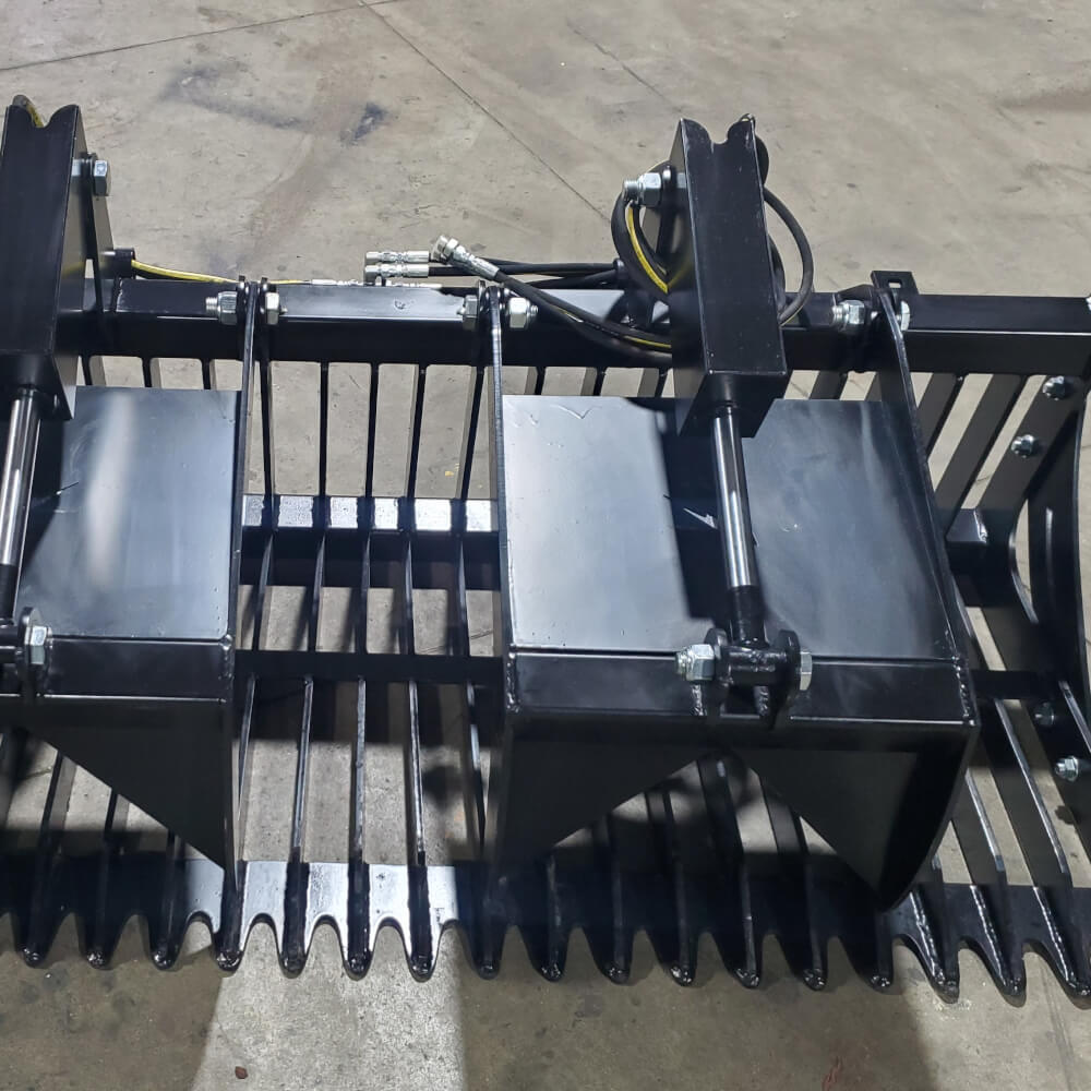 Rock and Brush Grapple by Glacier Attachments, black, top-down view with dual claws and hydraulic lines.