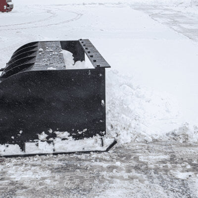 Skid Steer Snow Box by Prime Attachments, black, angled view, designed for snow removal.