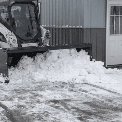 Skid Steer Snow Box by Prime Attachments, black, angled view, clearing snow efficiently.