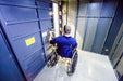 Swisher 20 Person ESP Wheelchair Accessible Storm Shelter, front view, sturdy metal design with wheelchair access.