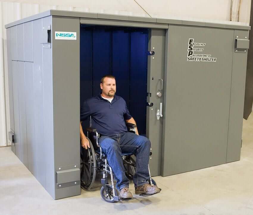 Swisher 20 Person ESP Wheelchair Accessible Storm Shelter, gray exterior, open front view, secure design.