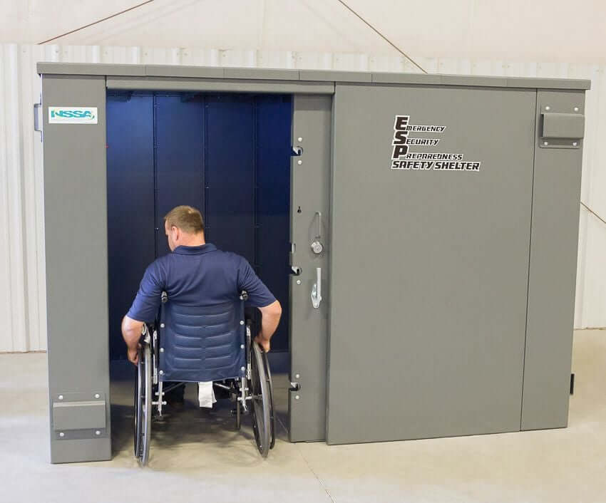 Swisher 20 Person ESP Wheelchair Accessible Storm Shelter, gray, front view, spacious interior for accessibility.