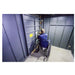 Swisher 20 Person ESP Wheelchair Accessible Storm Shelter interior view, featuring a door and wheelchair.