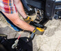 Swisher 2850 62" UTV Plow Blade attachment, black, showing mounting mechanism and rope.