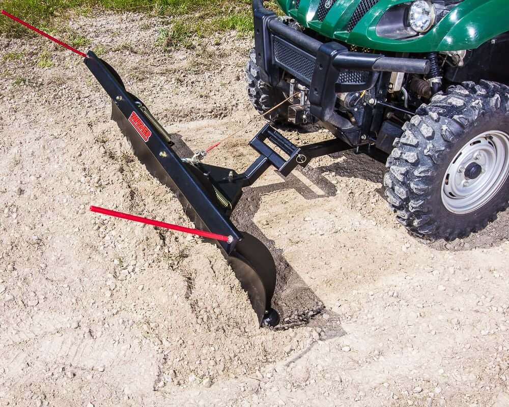Swisher 2850 62" UTV plow blade, black with red support bars, angled view.