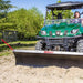 Swisher 2850 62" UTV plow blade, black with red accents, angled front view for versatility.