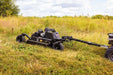 Swisher 44 Commercial Pro Rough Cut Mower, black, angled view with robust wheels and engine.