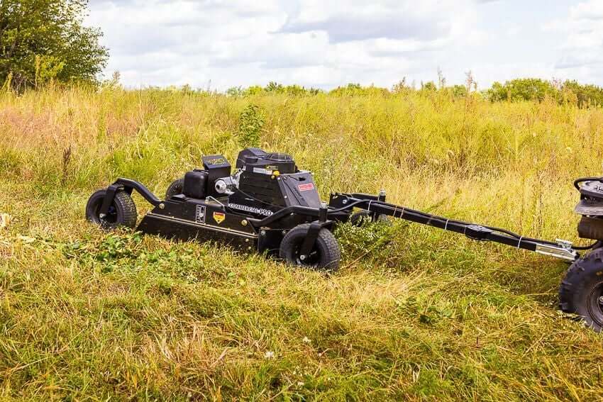 Swisher 44 Commercial Pro Rough Cut Mower, black, angled view with robust wheels and engine.