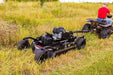 Swisher 44 Commercial Pro Rough Cut Mower, black, side view with powerful engine and rugged wheels.