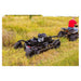 Swisher 44 Commercial Pro Rough Cut Mower, black, side view with powerful engine and rugged wheels.