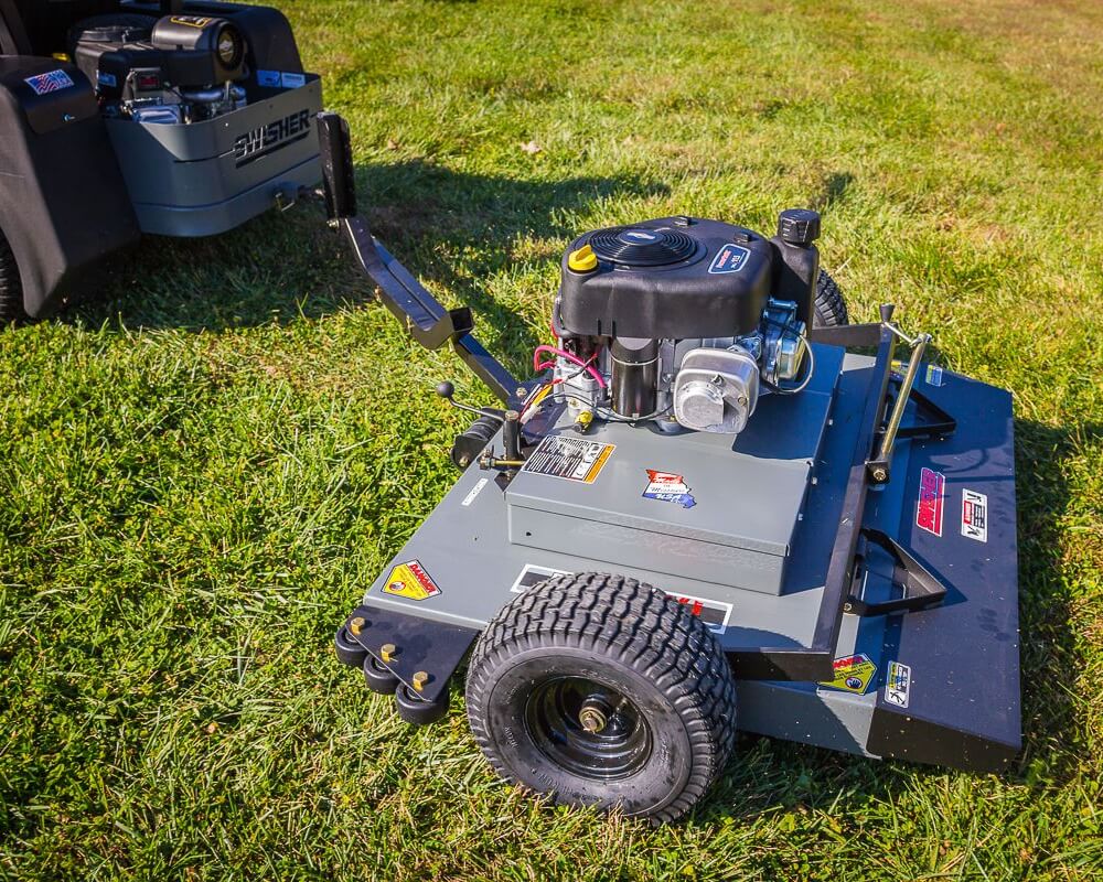 Swisher 44 Finish Cut Mower, gray color, angled view with Briggs & Stratton engine and wheels.