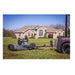 Swisher 44 Trail Mower with 11.5 HP engine, gray with large rear wheels and tow attachment.