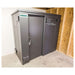 Swisher 6 Person ESP Safety Shelter front view, gray exterior with secure locking door and sturdy design.