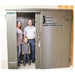 Swisher 6 Person ESP Safety Shelter front view, gray metal construction with a secure locking mechanism.