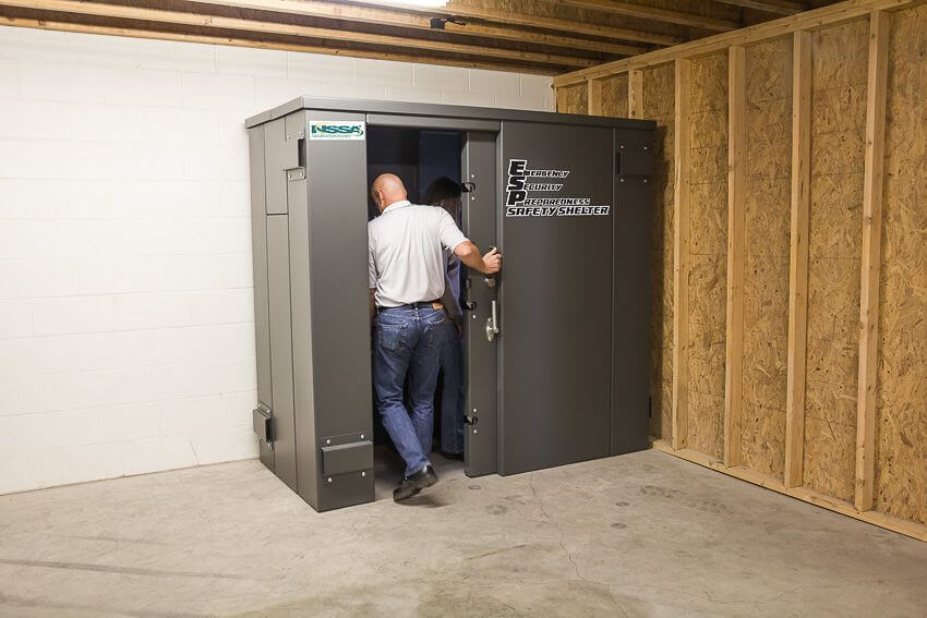 Swisher 6 Person ESP Safety Shelter in gray, front view with dual doors for access.