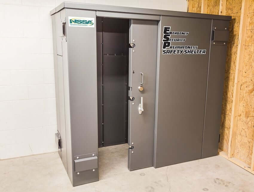 Swisher 6 Person ESP Safety Shelter, gray metal construction with a sturdy door and lock.