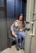Swisher 6 Person ESP Safety Shelter interior view, featuring gray walls and seating.