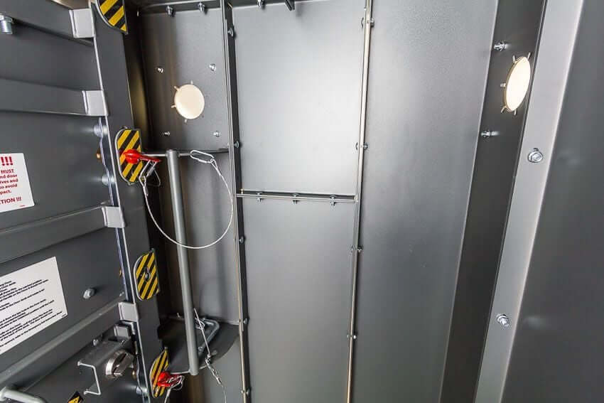 Swisher 6 Person ESP Safety Shelter interior view, featuring metal construction and safety details.