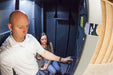 Swisher 6 Person ESP Safety Shelter, interior view with sturdy walls and secure door handle.