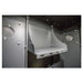 Swisher 6 Person ESP Safety Shelter internal view with gray metal shelves and ventilation openings.
