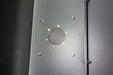 Swisher 6 Person ESP Safety Shelter top view, gray metal with circular vent and screws.