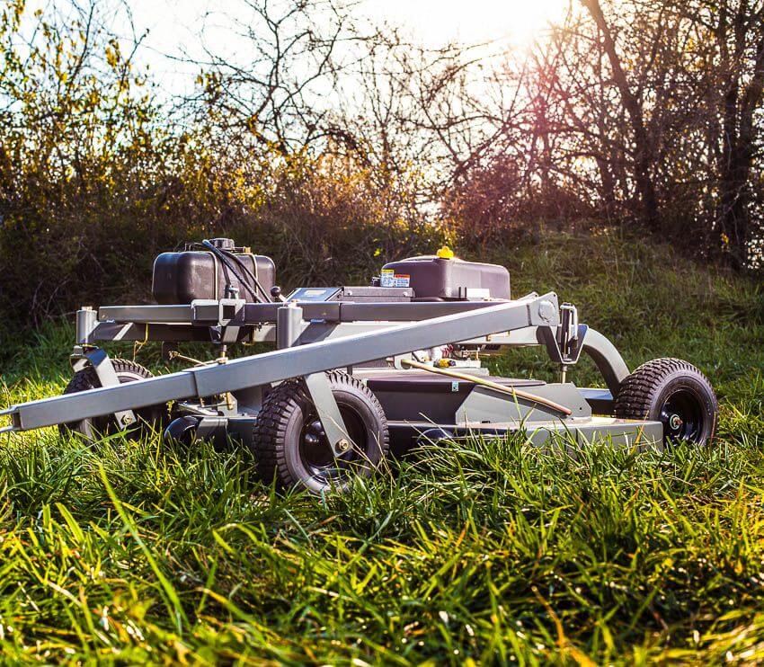 Swisher 60" Trail Mower 12V 15.5 HP, angled view with wheels and engine components visible.