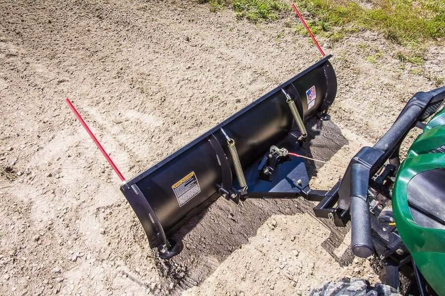 Swisher 62" UTV Commercial Pro Plow Combo, black angled view with red markers and mounting hardware.