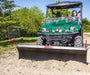 Swisher 62" UTV Commercial Pro Plow Combo front view, green with a black blade and red handles.