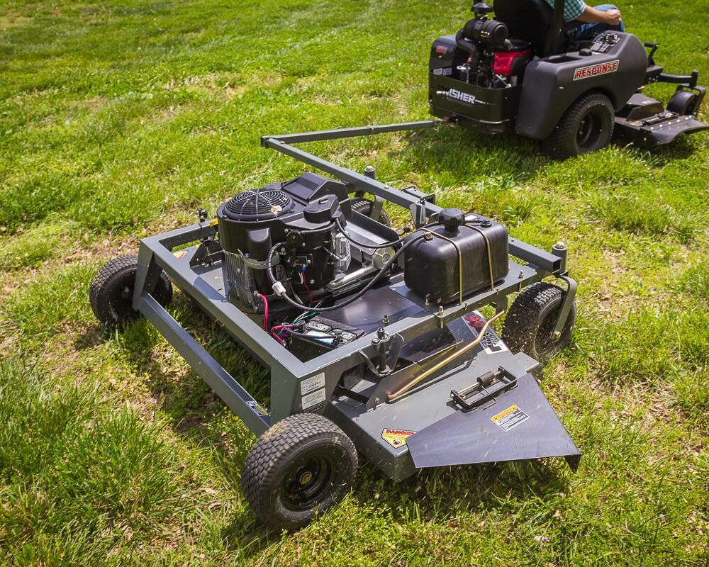 Swisher 66 Commercial Mower, gray with 14.5HP Kawasaki engine and durable wheels.