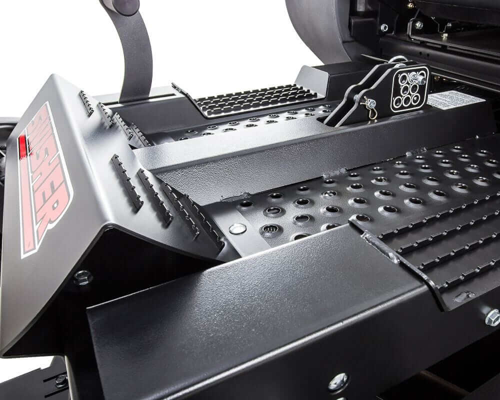 Swisher 66 Zero Turn Mower control panel view, featuring a sturdy design and textured surfaces.